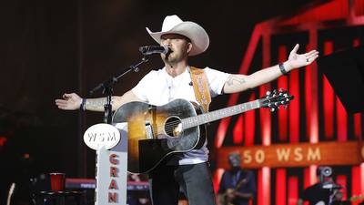 Justin Moore’s “With a Woman You Love” coincides with major milestones in his marriage